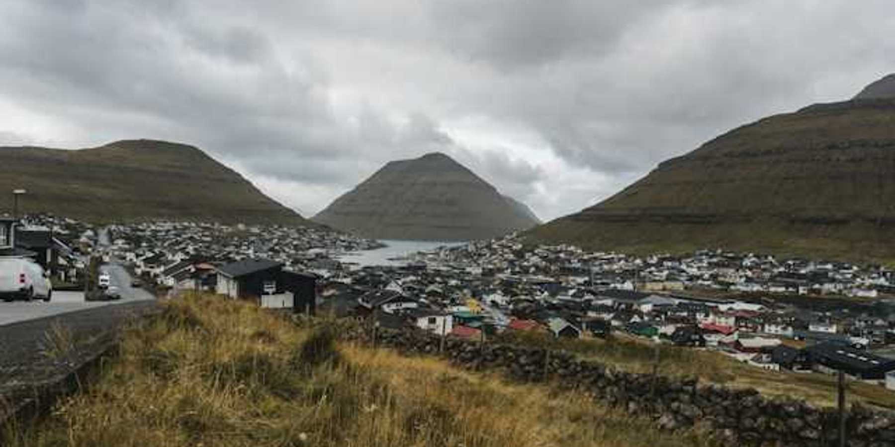 A view of a small fishing village town in the mountains