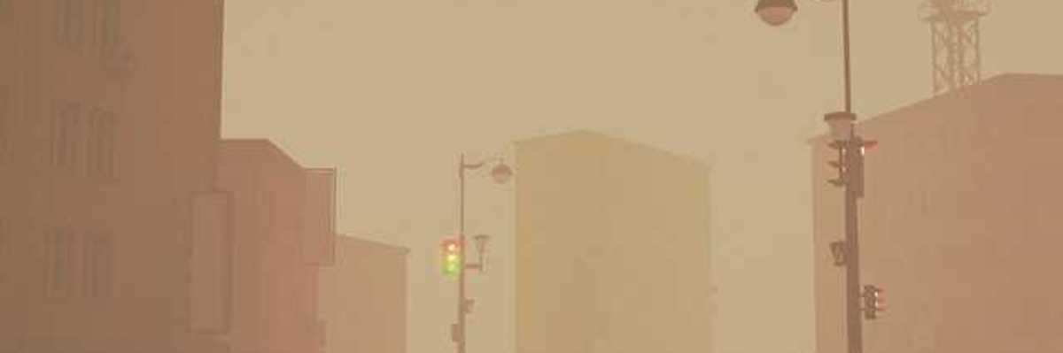 A view of a street with streetlamps with fog or smoke in the atmosphere