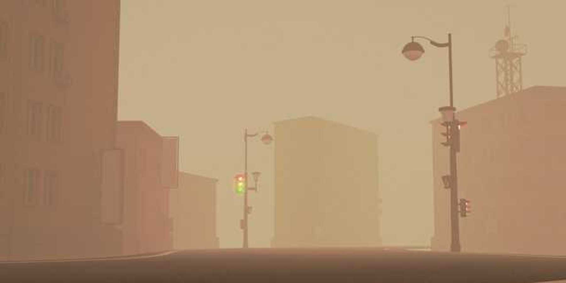A view of a street with streetlamps with fog or smoke in the atmosphere