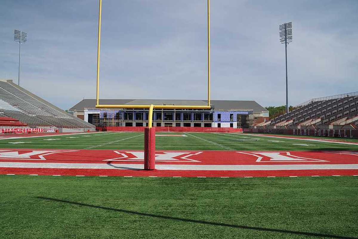 A view of a university stadium from the end zone
