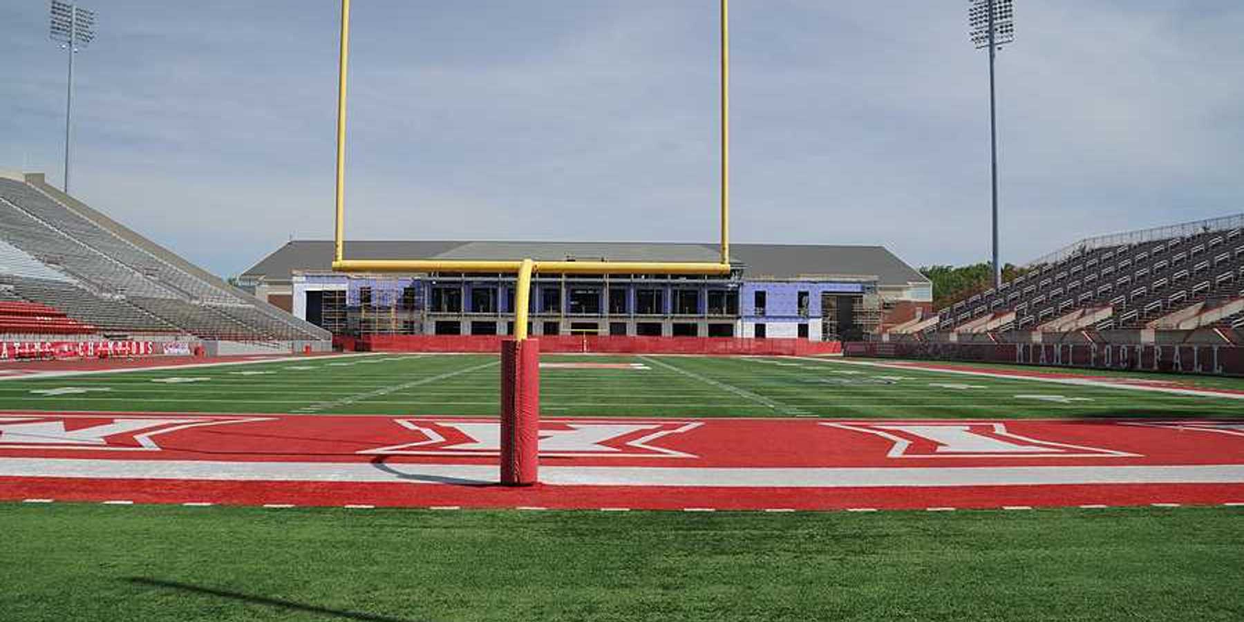 A view of a university stadium from the end zone