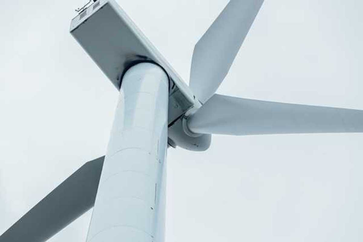 A view of a wind turbine from below