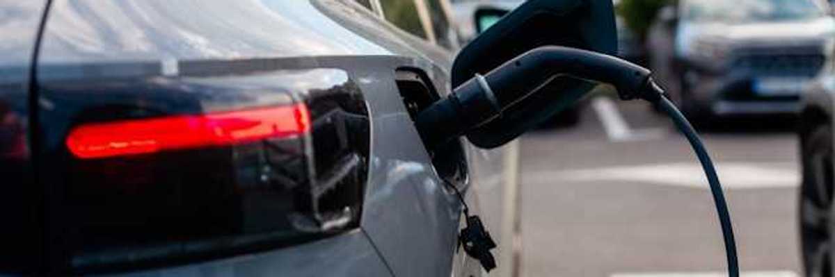 A view of an electric vehicle being charged