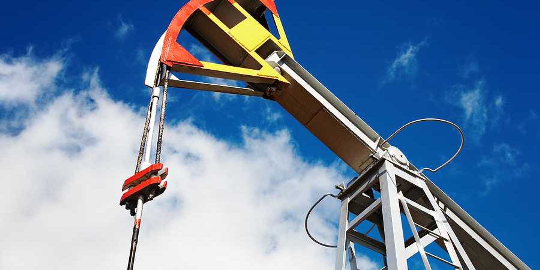 A view of an oil drilling pump jack from below