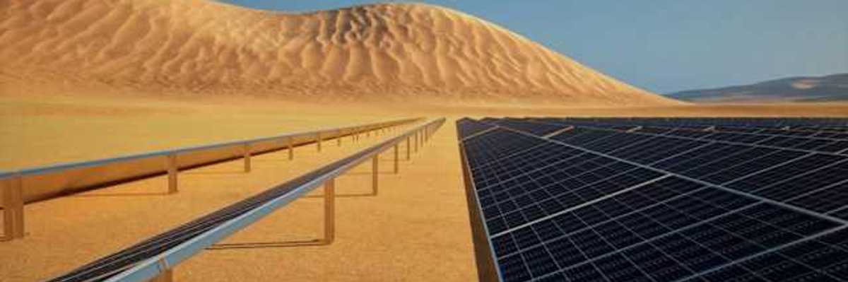A view of solar panels in a desert setting