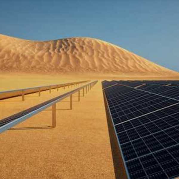 A view of solar panels in a desert setting