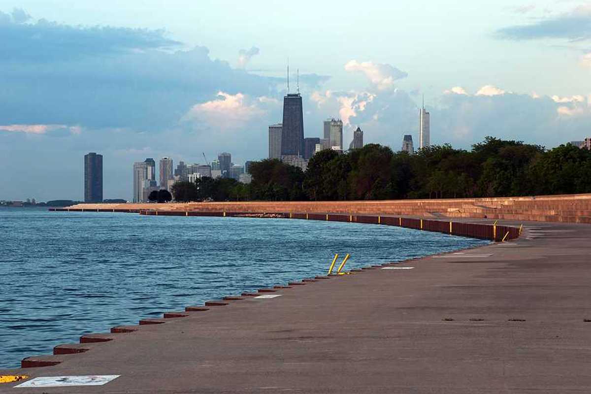A view of the Chicago skyline with the lake in the foreground