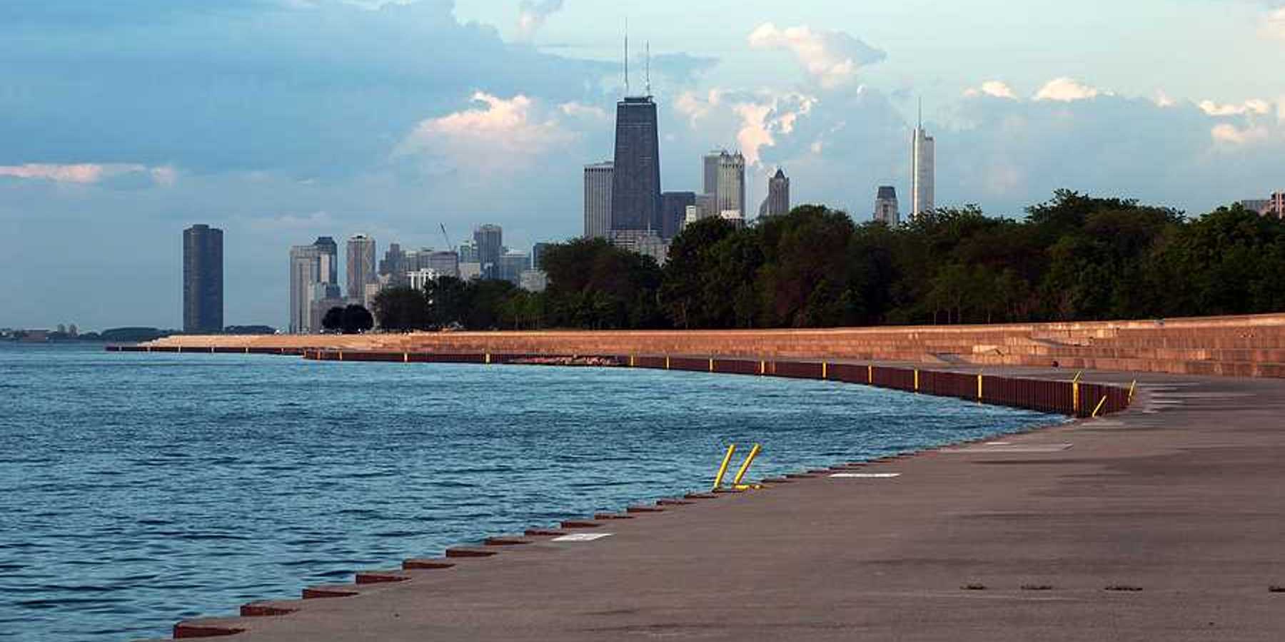 A view of the Chicago skyline with the lake in the foreground