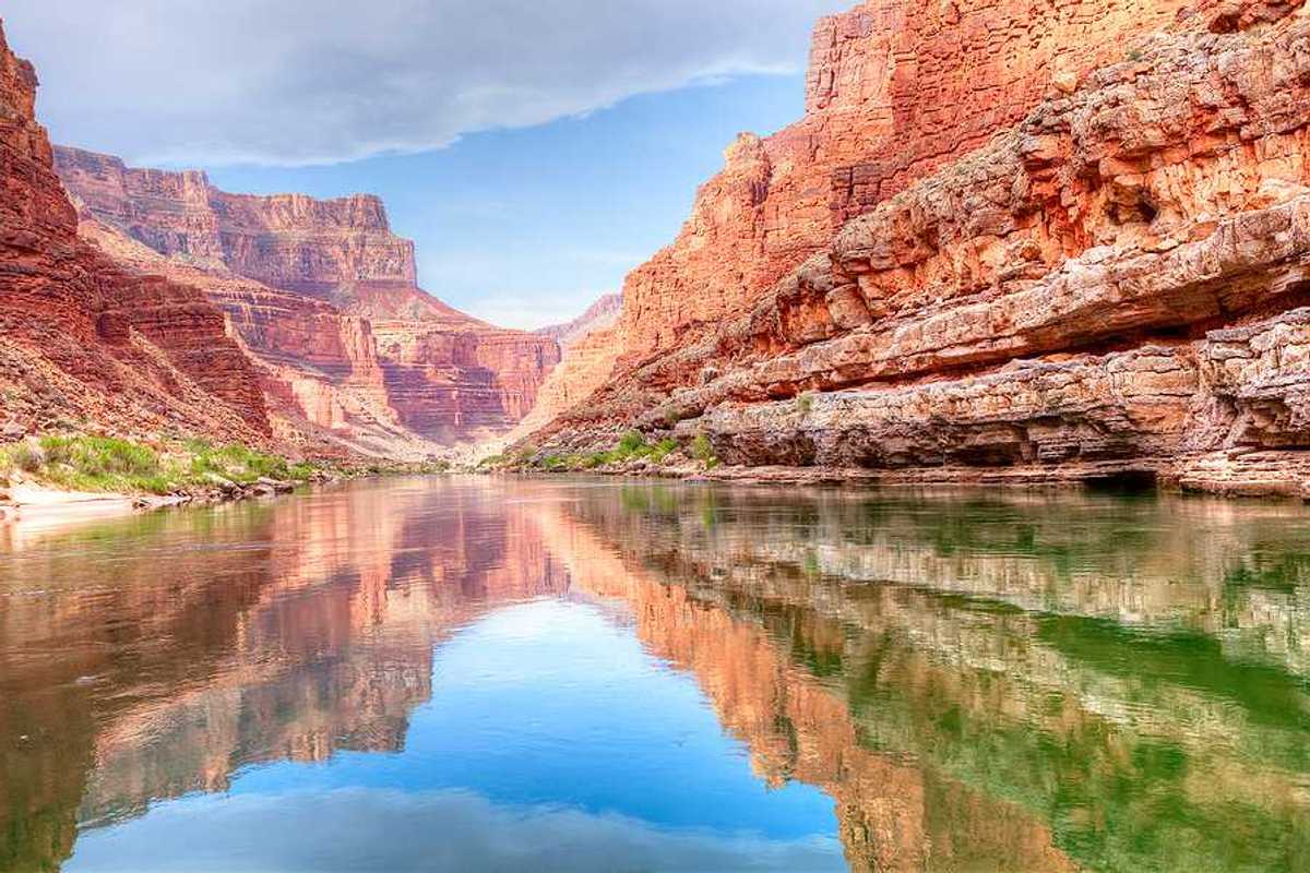 A view of the Colorado River from the bottom of a canyon