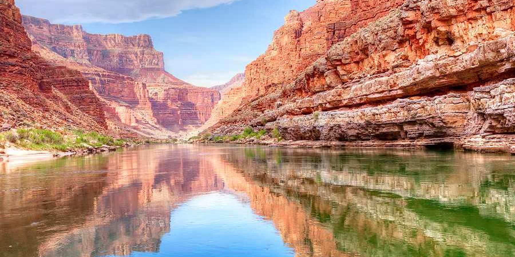 A view of the Colorado River from the bottom of a canyon