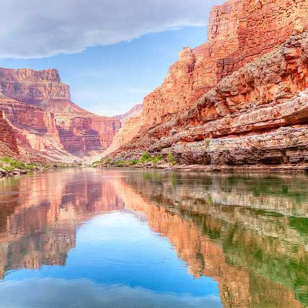A view of the Colorado River from the bottom of a canyon