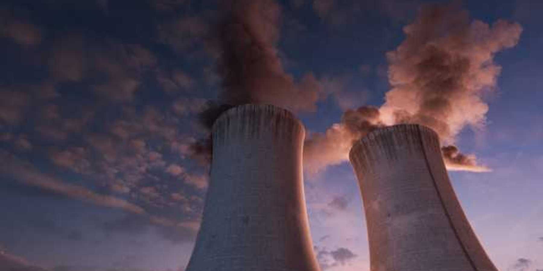 A view of two nuclear towers at sunset