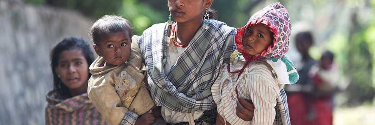 A young Nepalese woman with two children