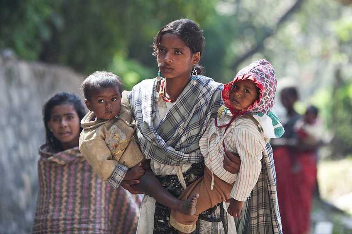 A young Nepalese woman with two children