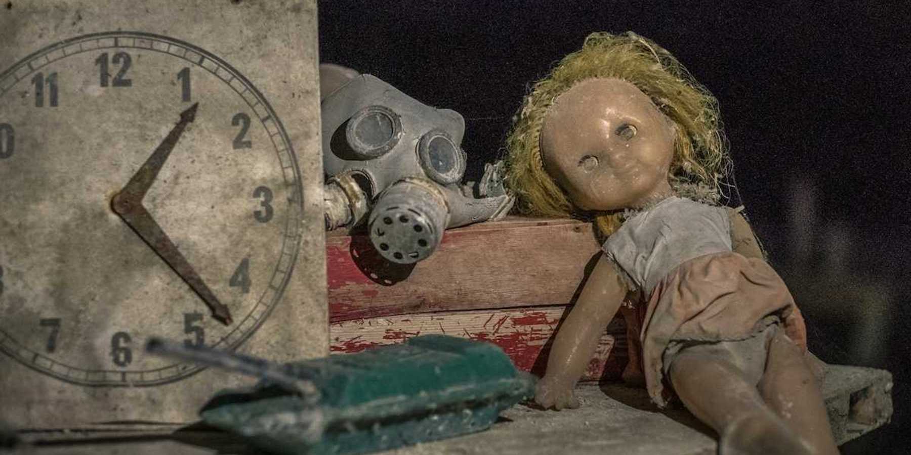 Abandoned items from kindergarten — gas mask, doll, toy tank in Chernobyl, Kyiv Oblast, Ukraine following Chernobyl nuclear disaster in 1986