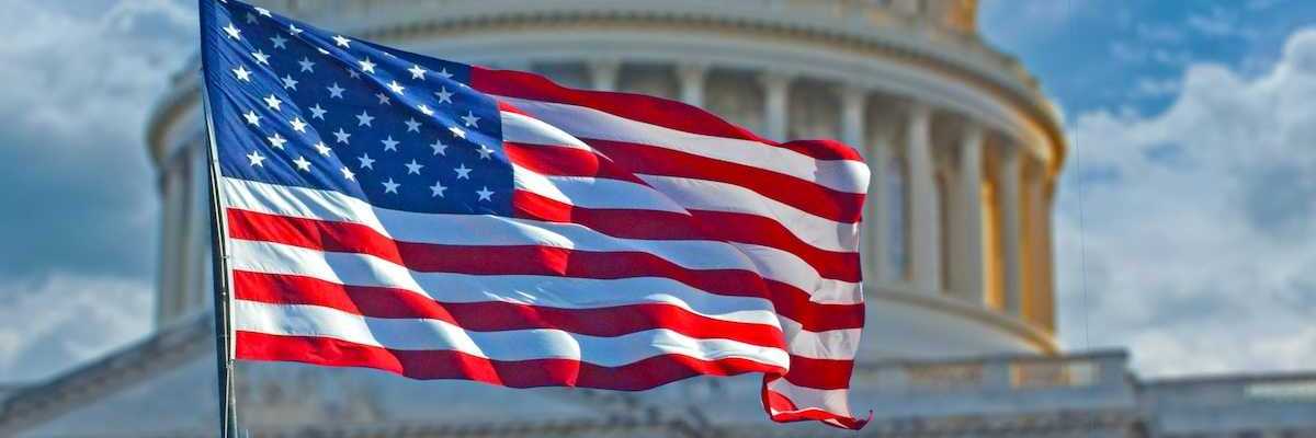 American flag superimposed against the U.S. capitol building.