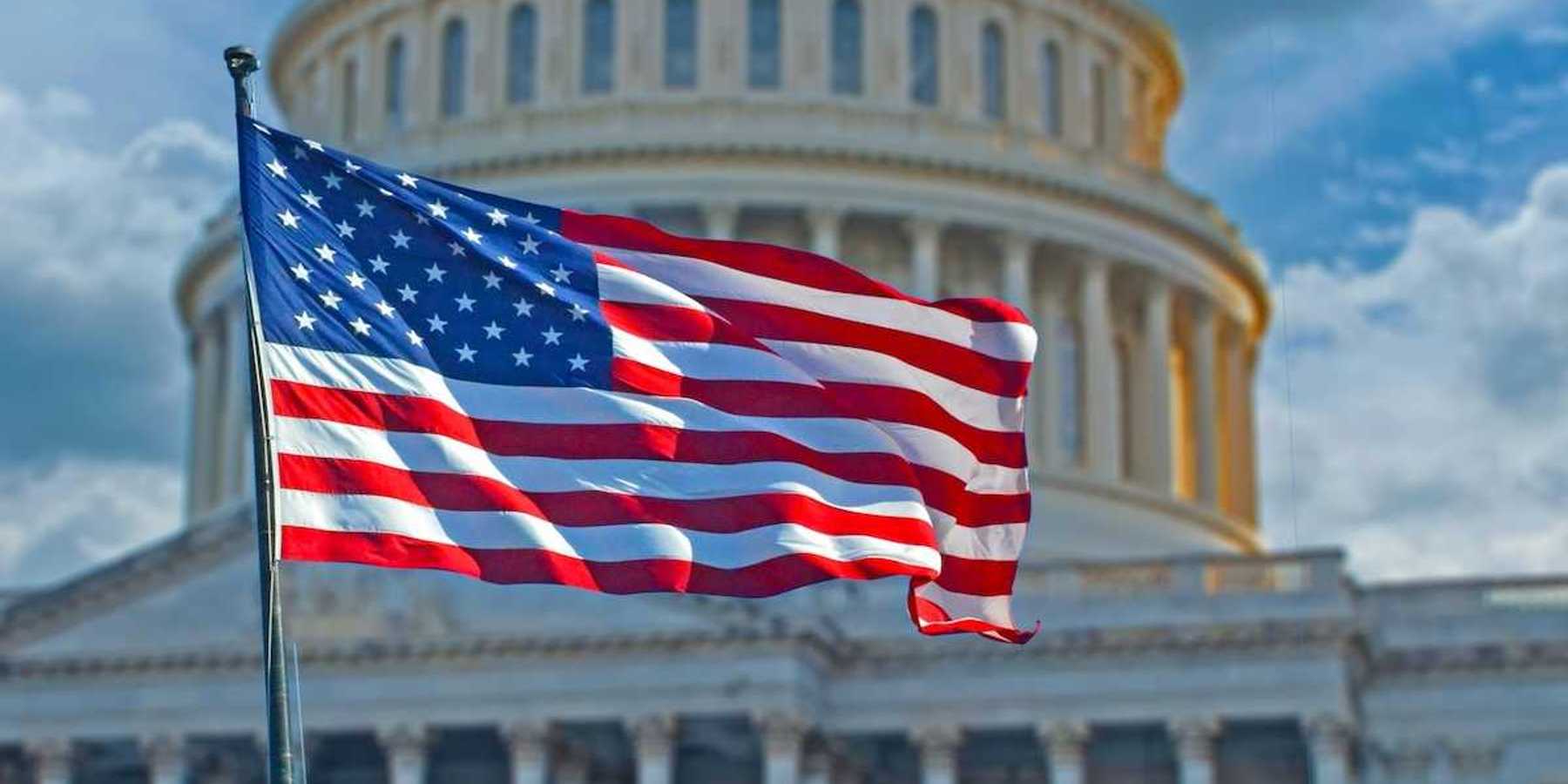 American flag superimposed against the U.S. capitol building.