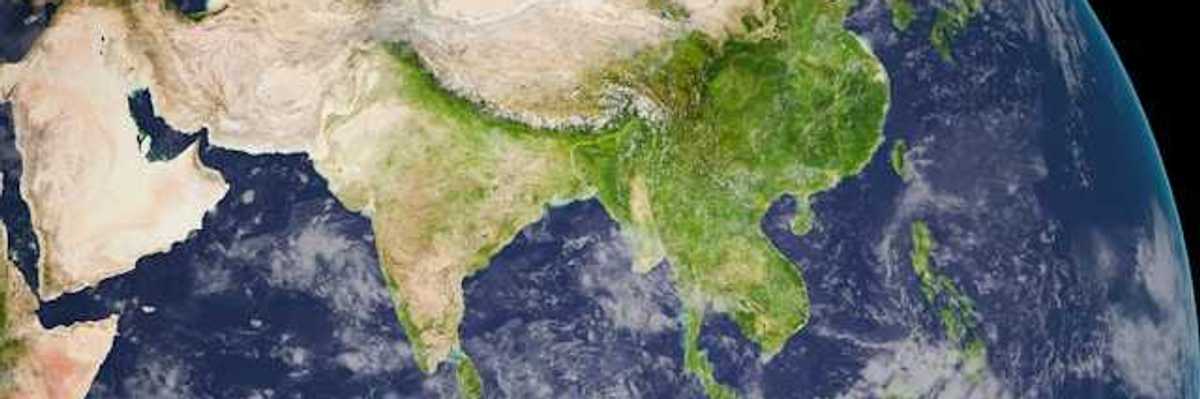 An aerial image of part of the earth with clouds visible