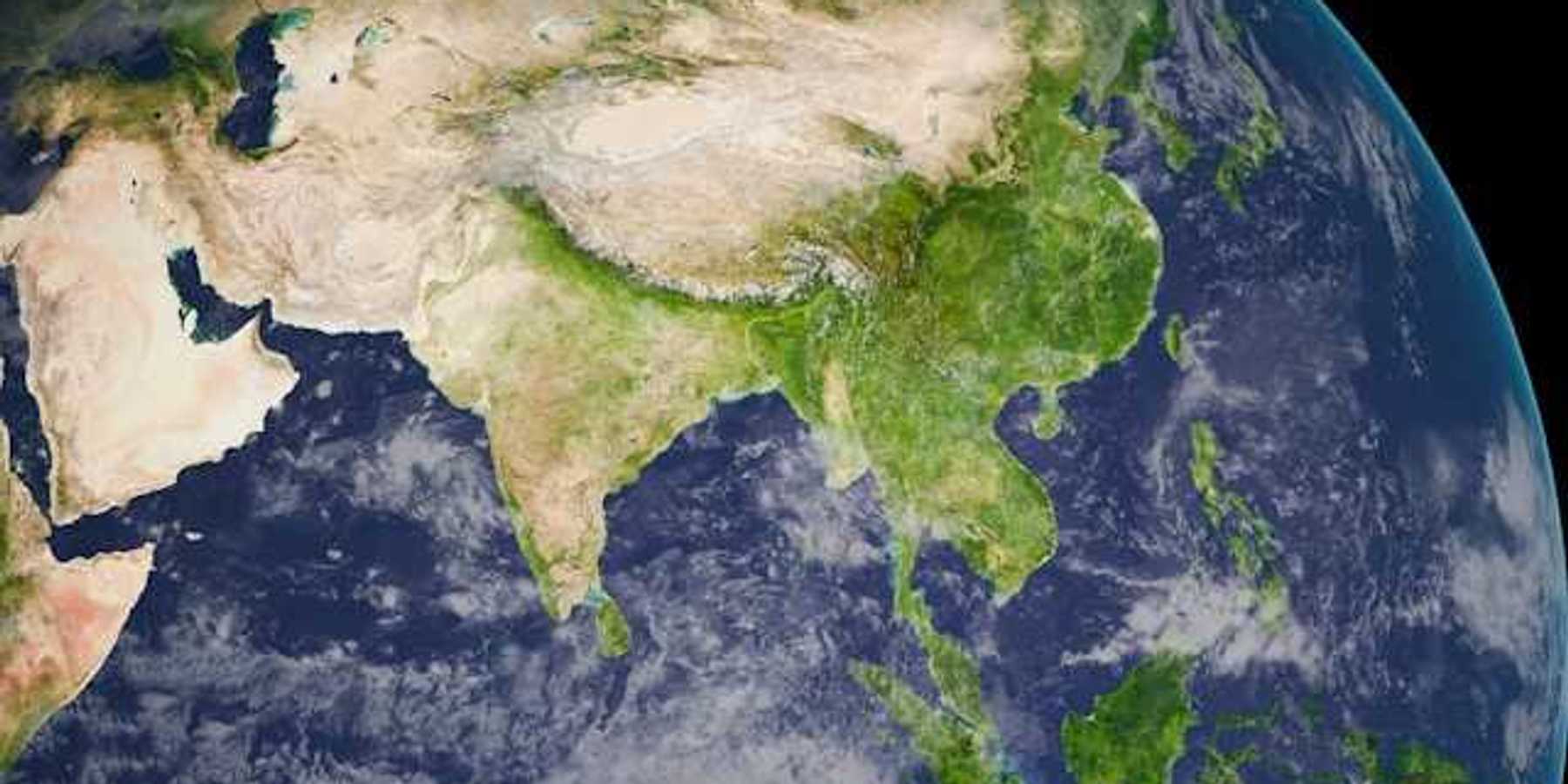 An aerial image of part of the earth with clouds visible