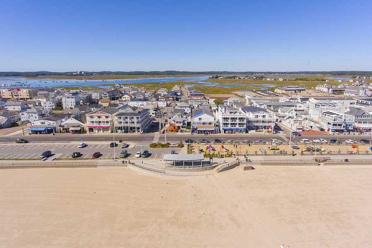 An aerial view of historic waterfront buildings on Ocean Boulevard and Hampton Beach State Park, Town of Hampton, New Hampshire NH