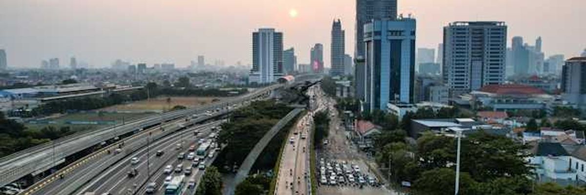 An Asian city with haze and pollution in the background