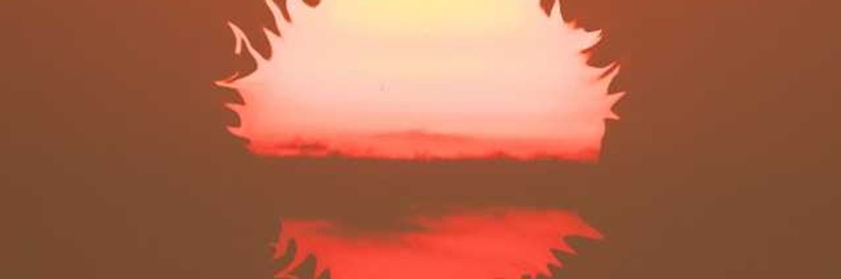 An illustration of a burning sun falling below the horizon