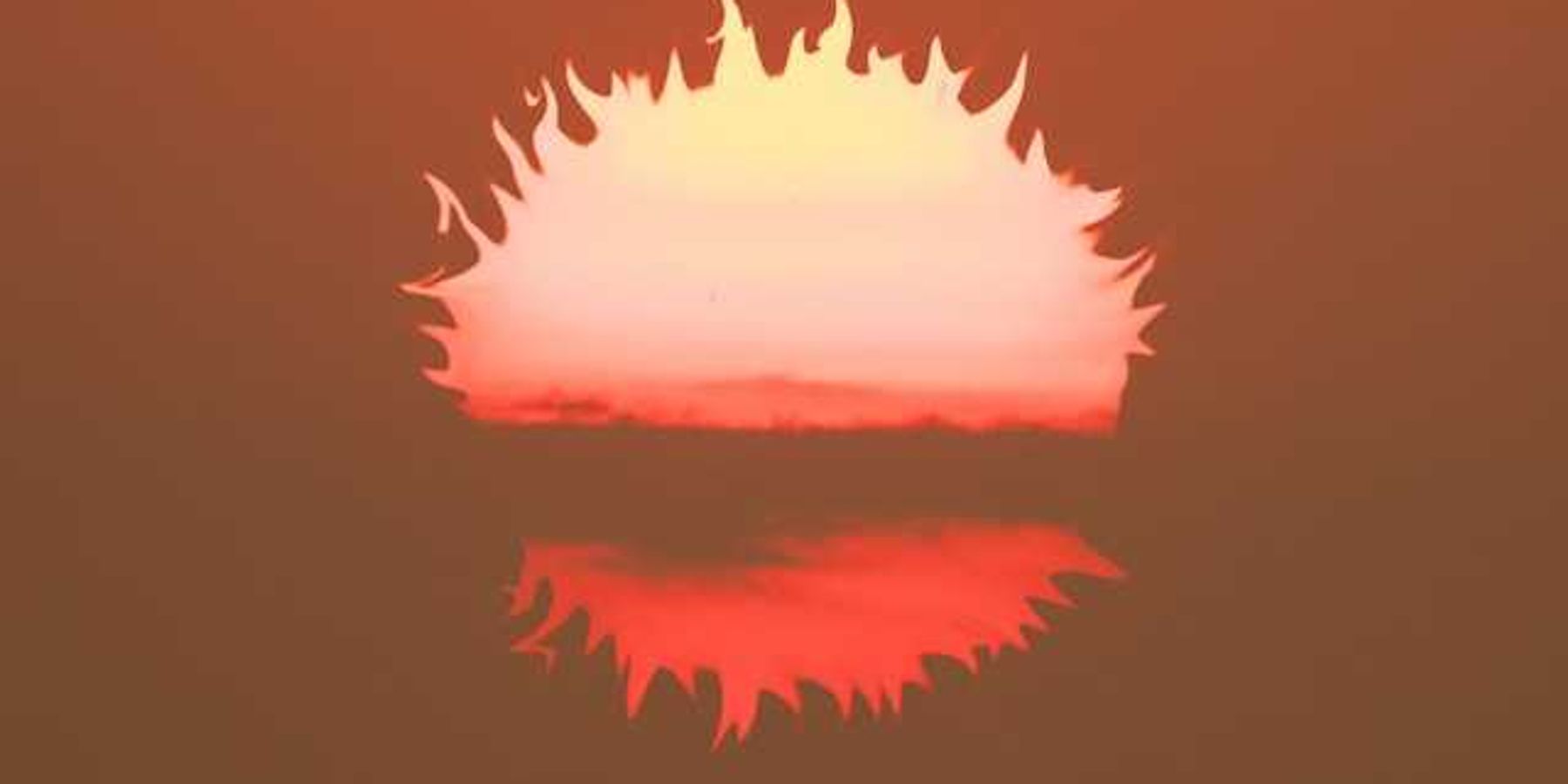 An illustration of a burning sun falling below the horizon