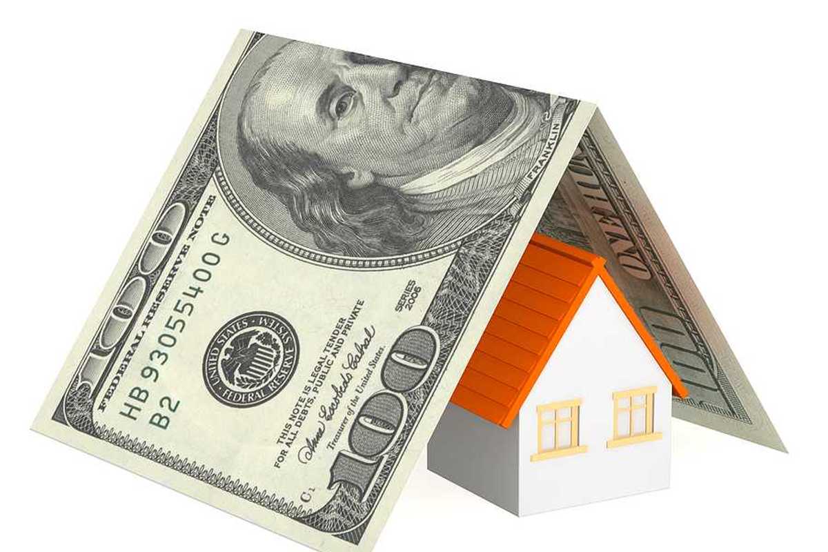 An illustration of a house covered in a folded $100 bill