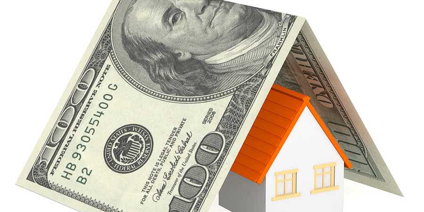 An illustration of a house covered in a folded $100 bill