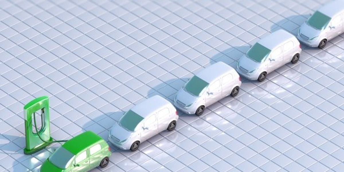 An illustration of a row of electric vehicles and vans lining up to an EV charger.