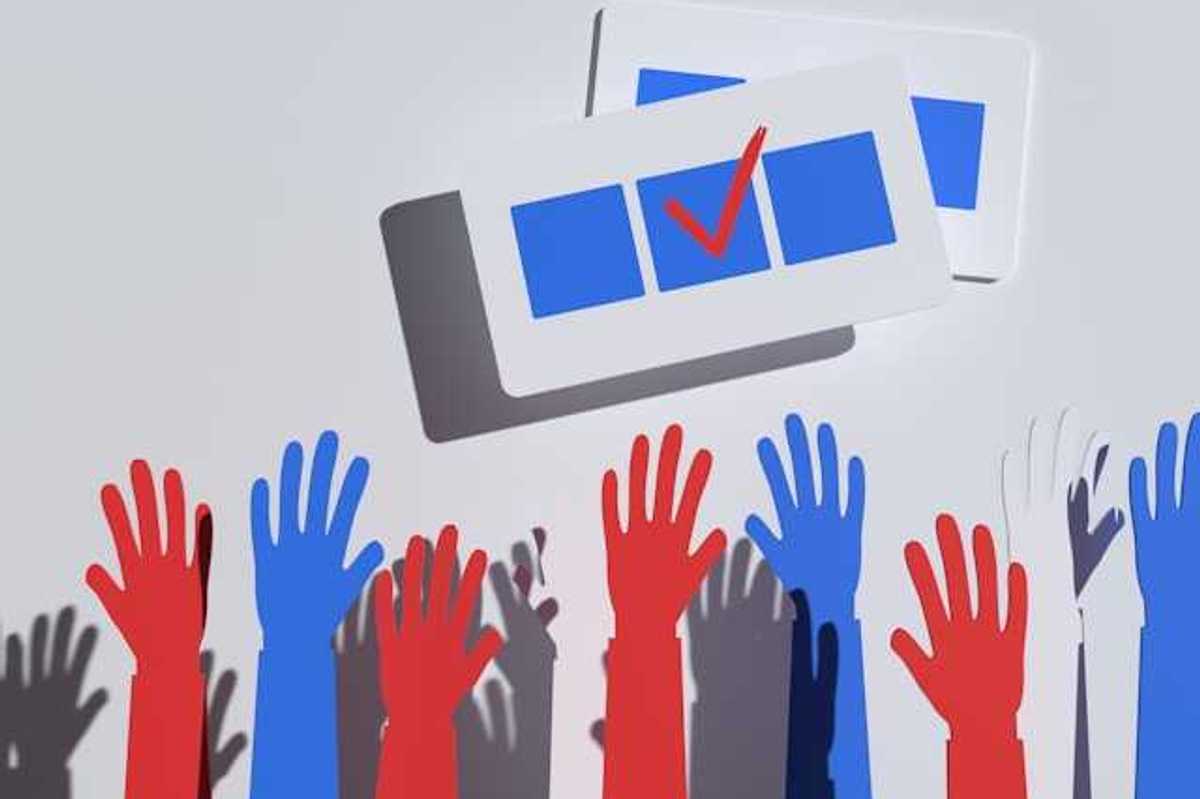 An illustration of hands reaching toward an election ballot
