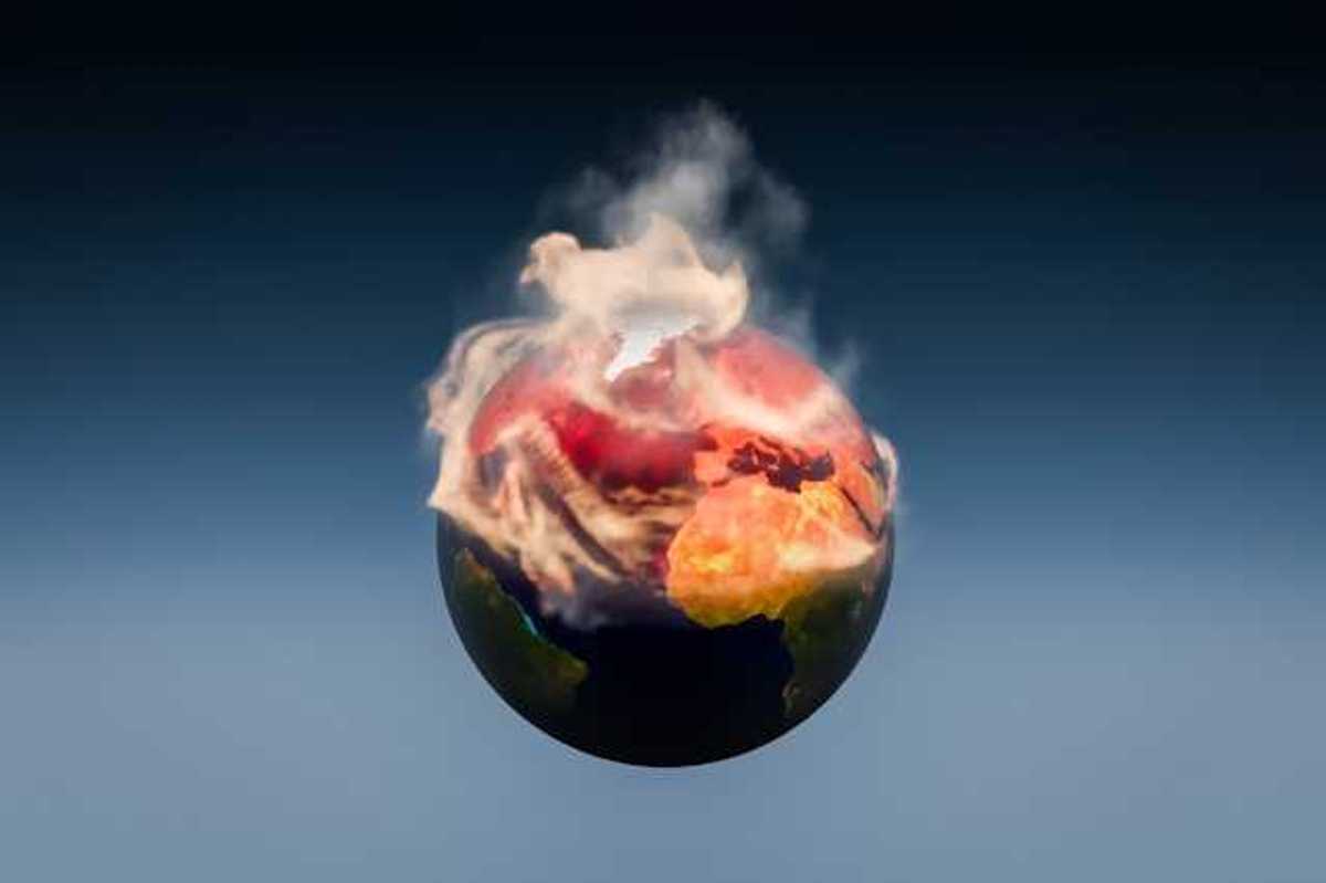 An illustration of planet Earth against a blue background with the top half on fire