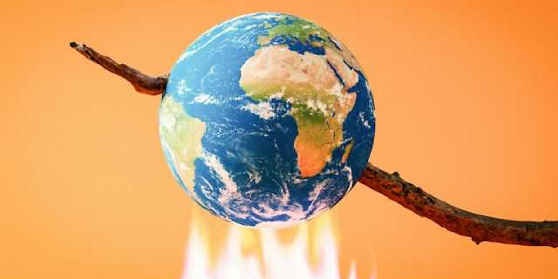An illustration of the earth on a stick being burned over a fire