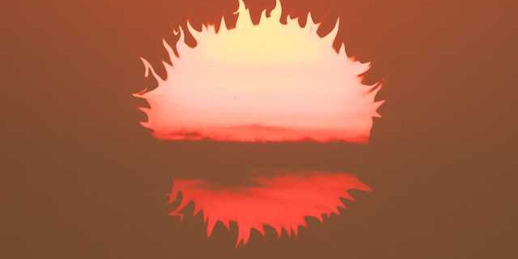An illustration of the setting sun in front of an orange sky