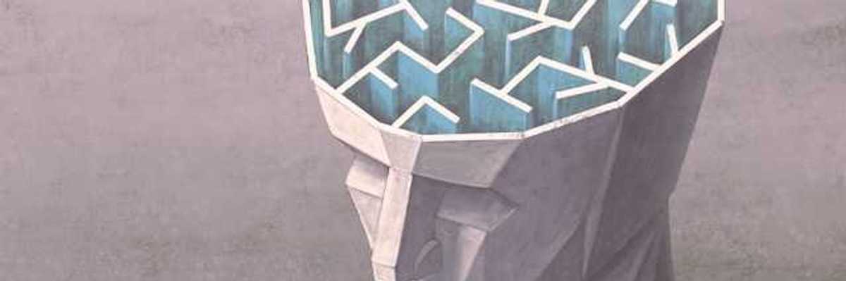 An illustration of the top of a human head with the brain exposed showing a maze