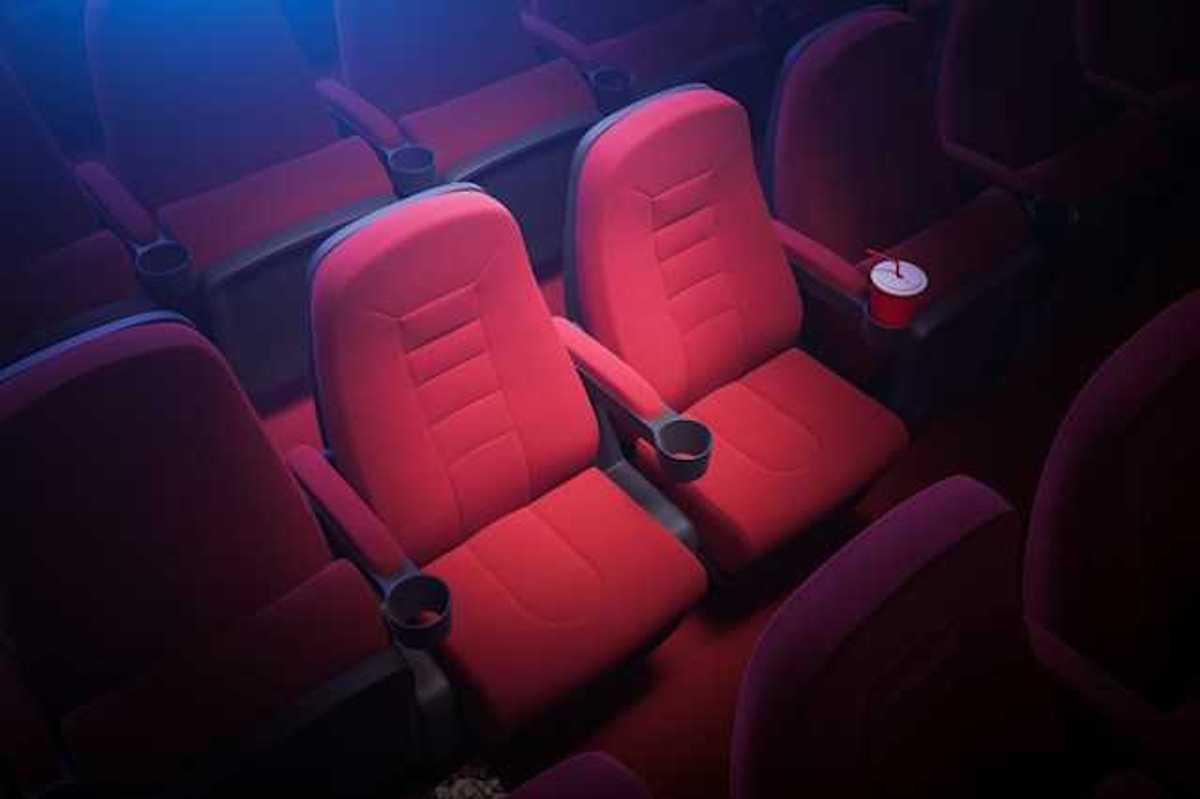 An illustration of two red movie theater seats