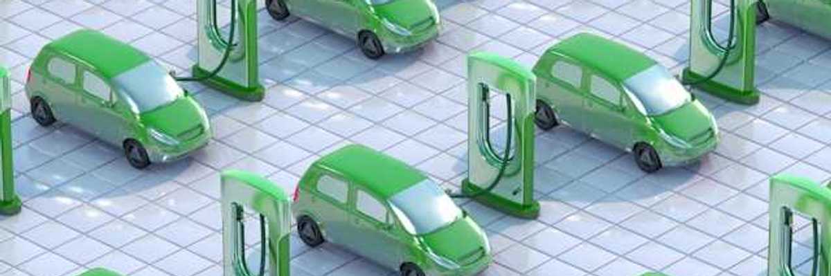 An illustration showing green electric vehicles hooked up to EV charging ports