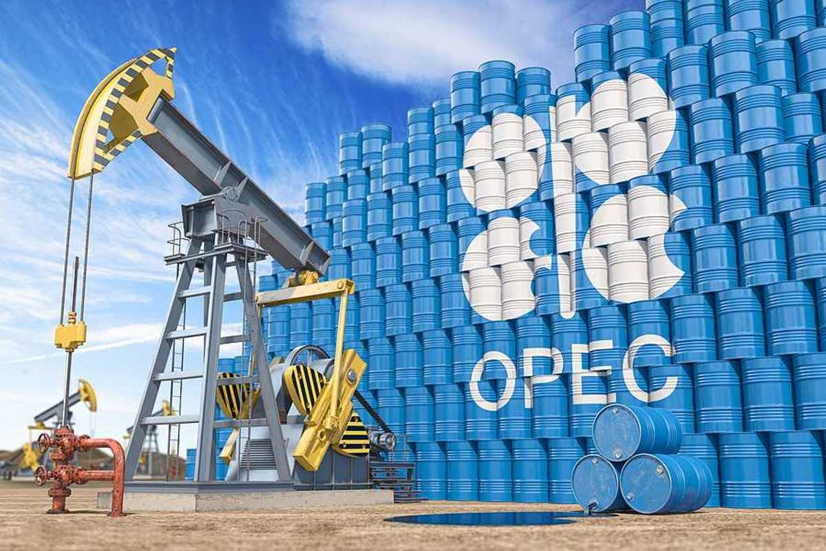 An illustration with a tower of blue oil drums with the word OPEC on it