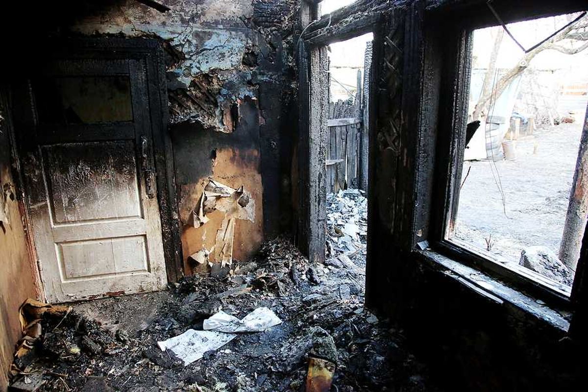 An interior photo of a burned home