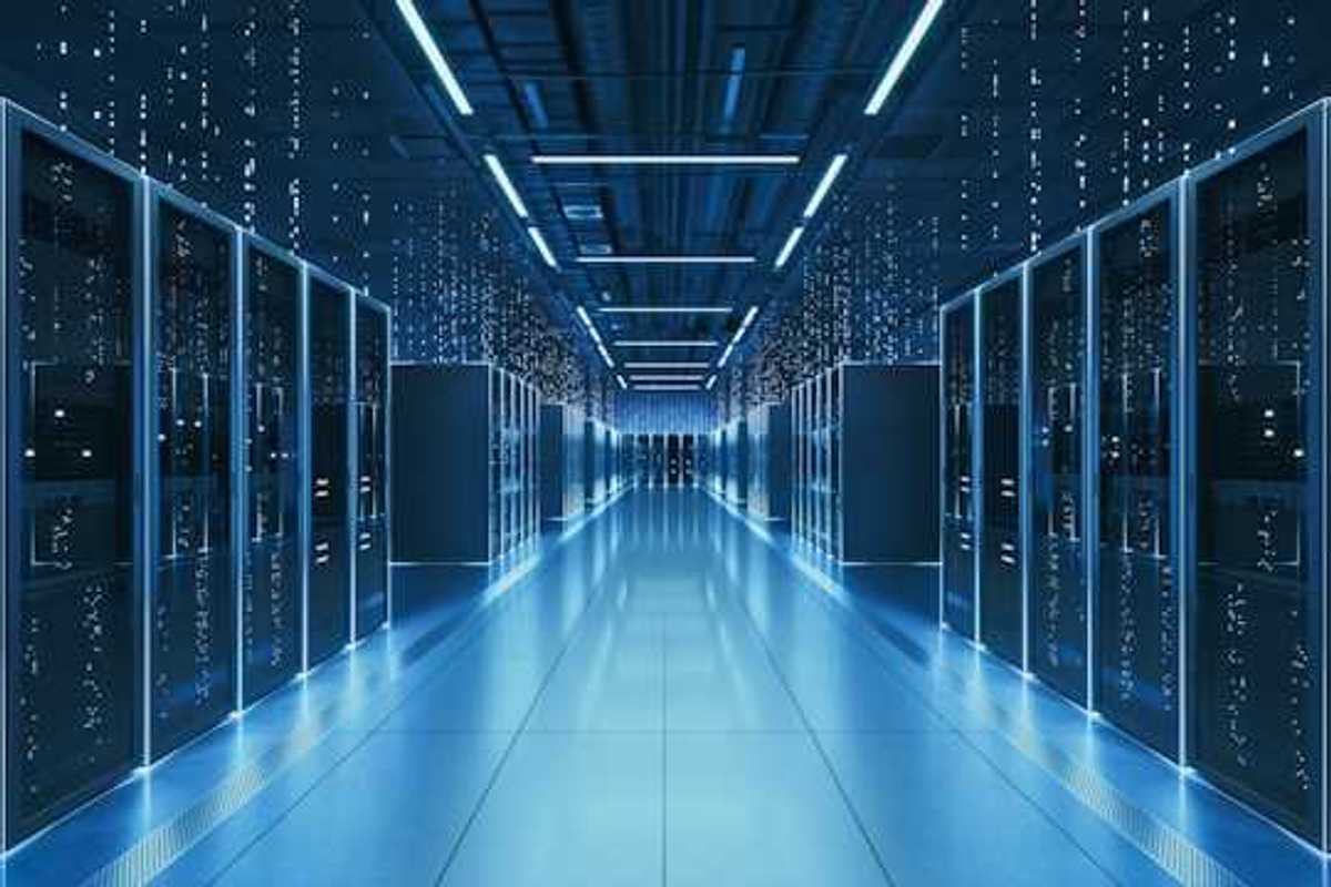 An interior view of a data center with servers stretching into the distance