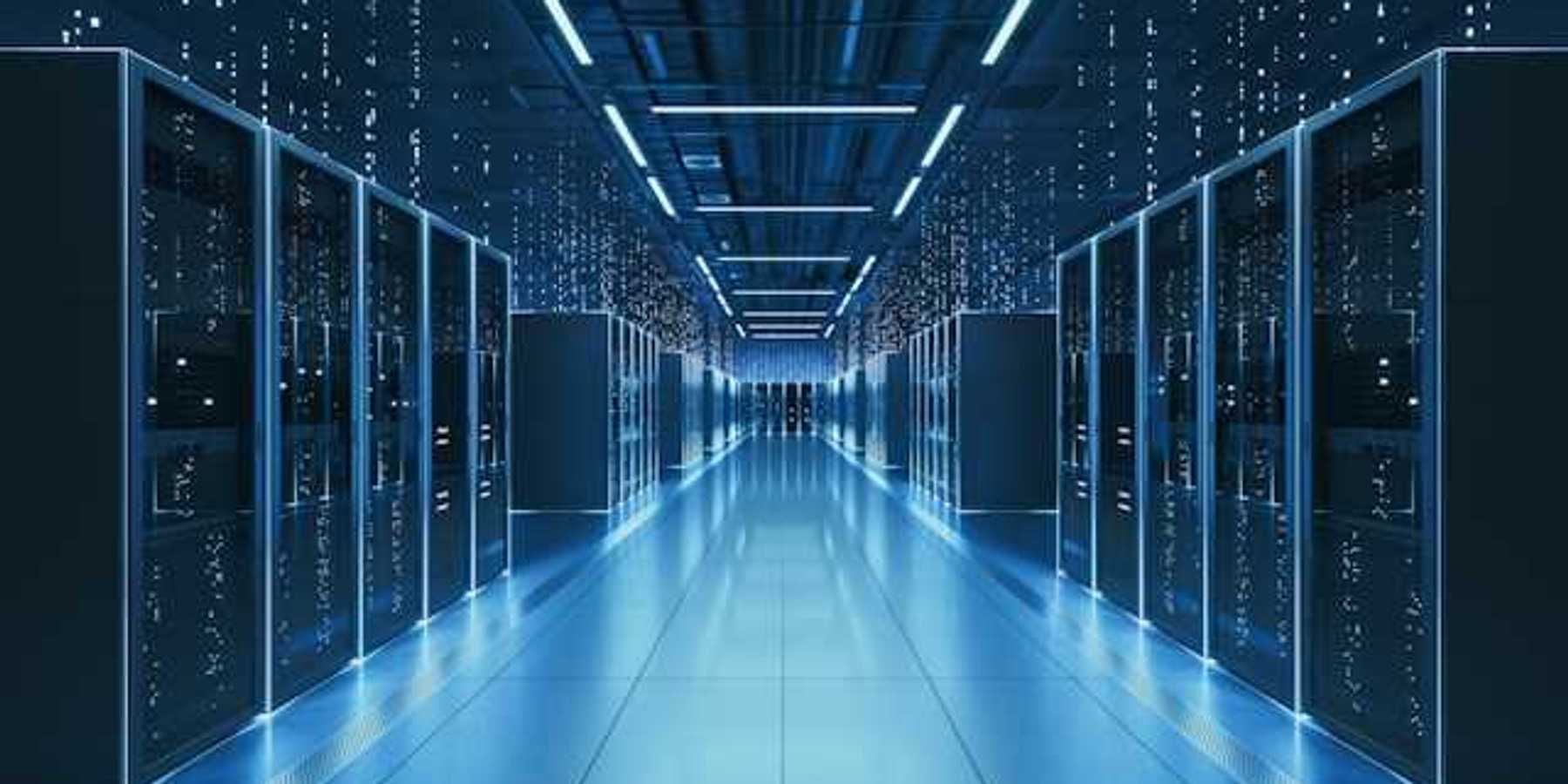 An interior view of a data center with servers stretching into the distance