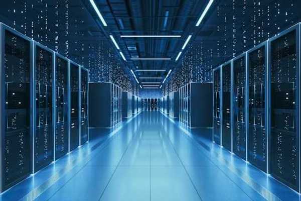 An interior view of a data center with servers stretching into the distance