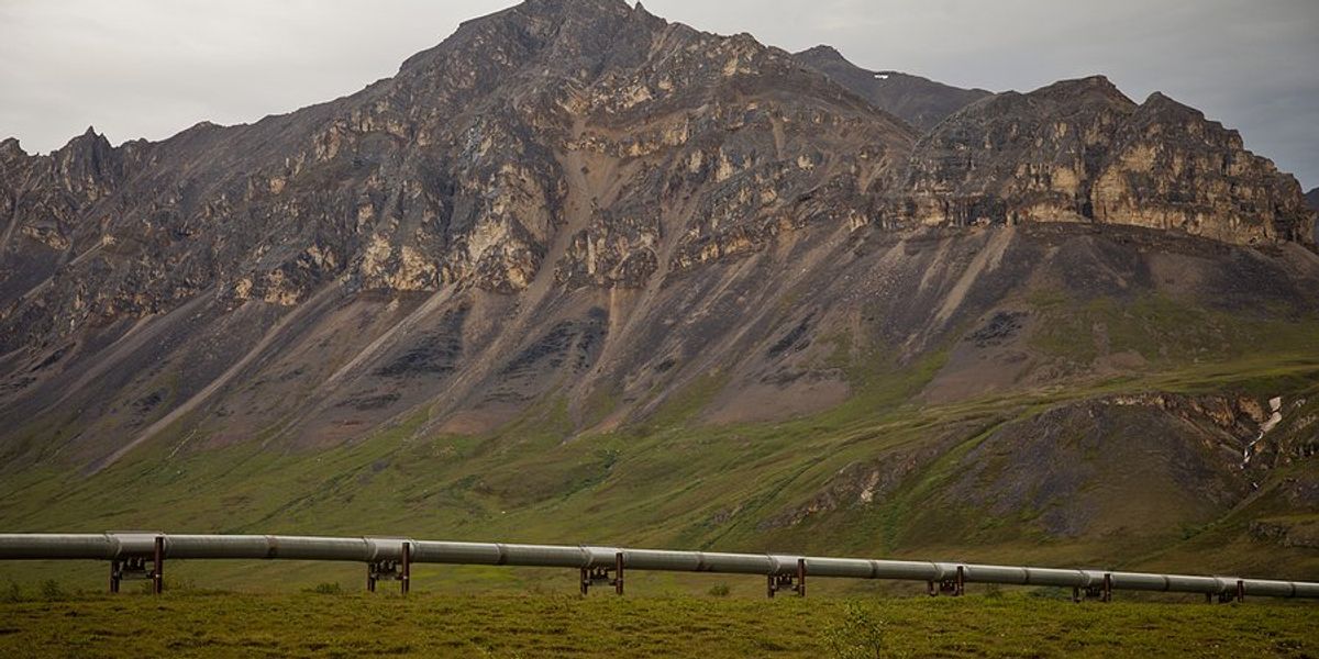 An oil pipeline stretching across a landscape.