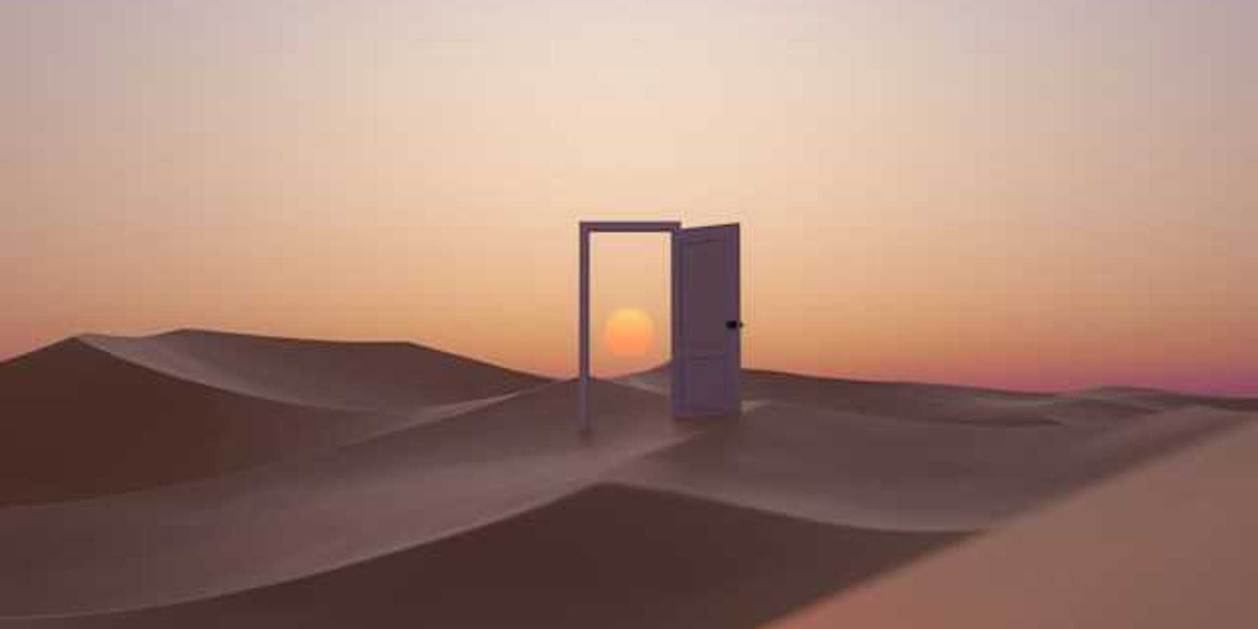 An open door in the middle of a desert with a sunset behind