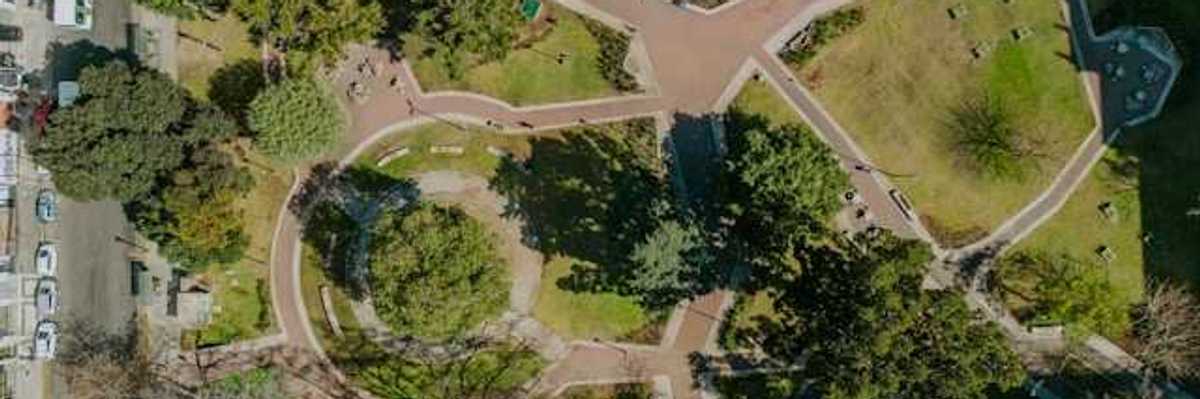 An overhead view of a park in an urban setting