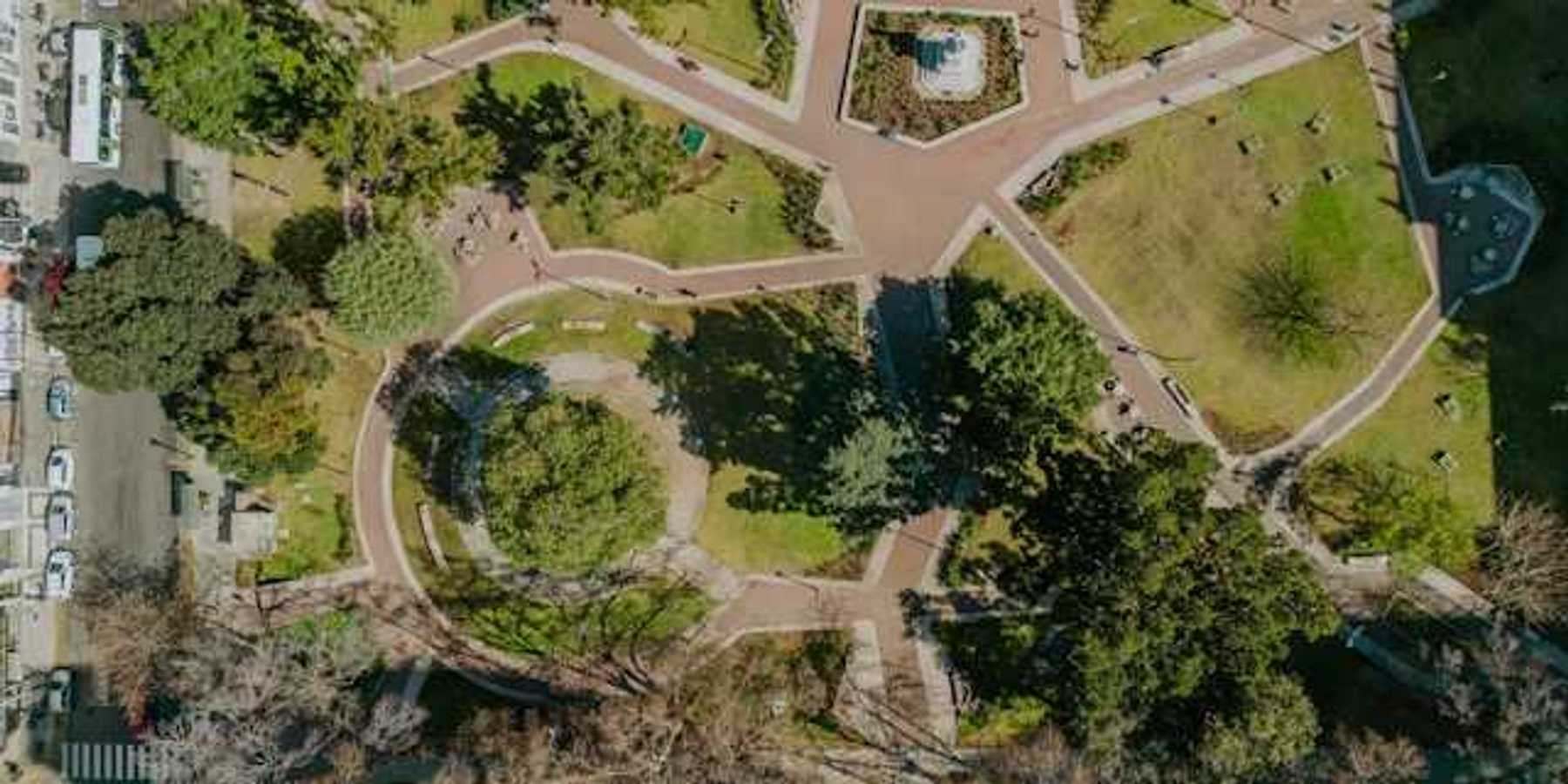 An overhead view of a park in an urban setting