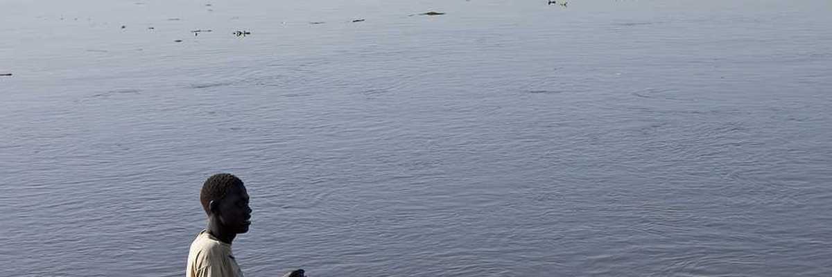 An unidentified man fishes in the White Nile river of South Sudan.
