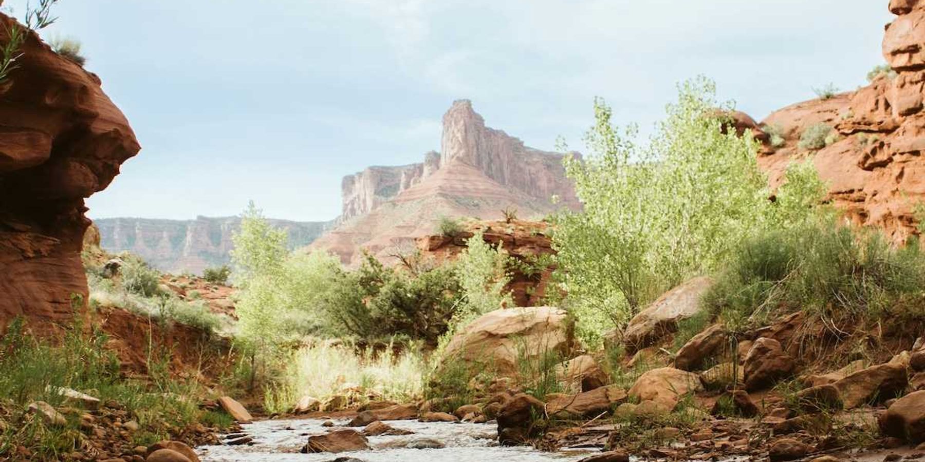 arroyo in the arid Southwest canyon country with water running through it