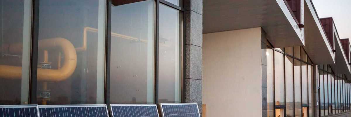 Balcony solar: solar panels on balcony of modern office building