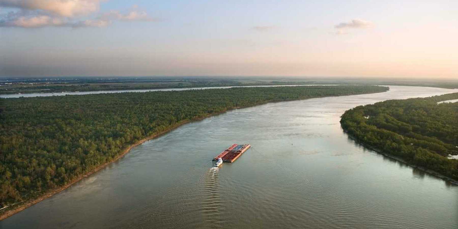 Barge transporting timber on the Congo River